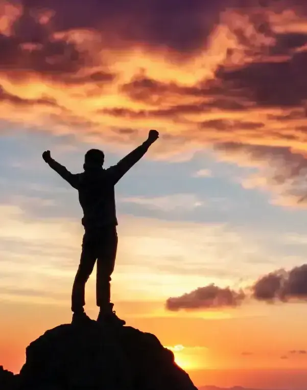 Leader achieving complete transformation and conquering deep-seated burnout obstacles with intensive executive accelerator program.